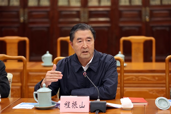 王宁与中央第七指导组组长程振山见面沟通2-600.jpg
